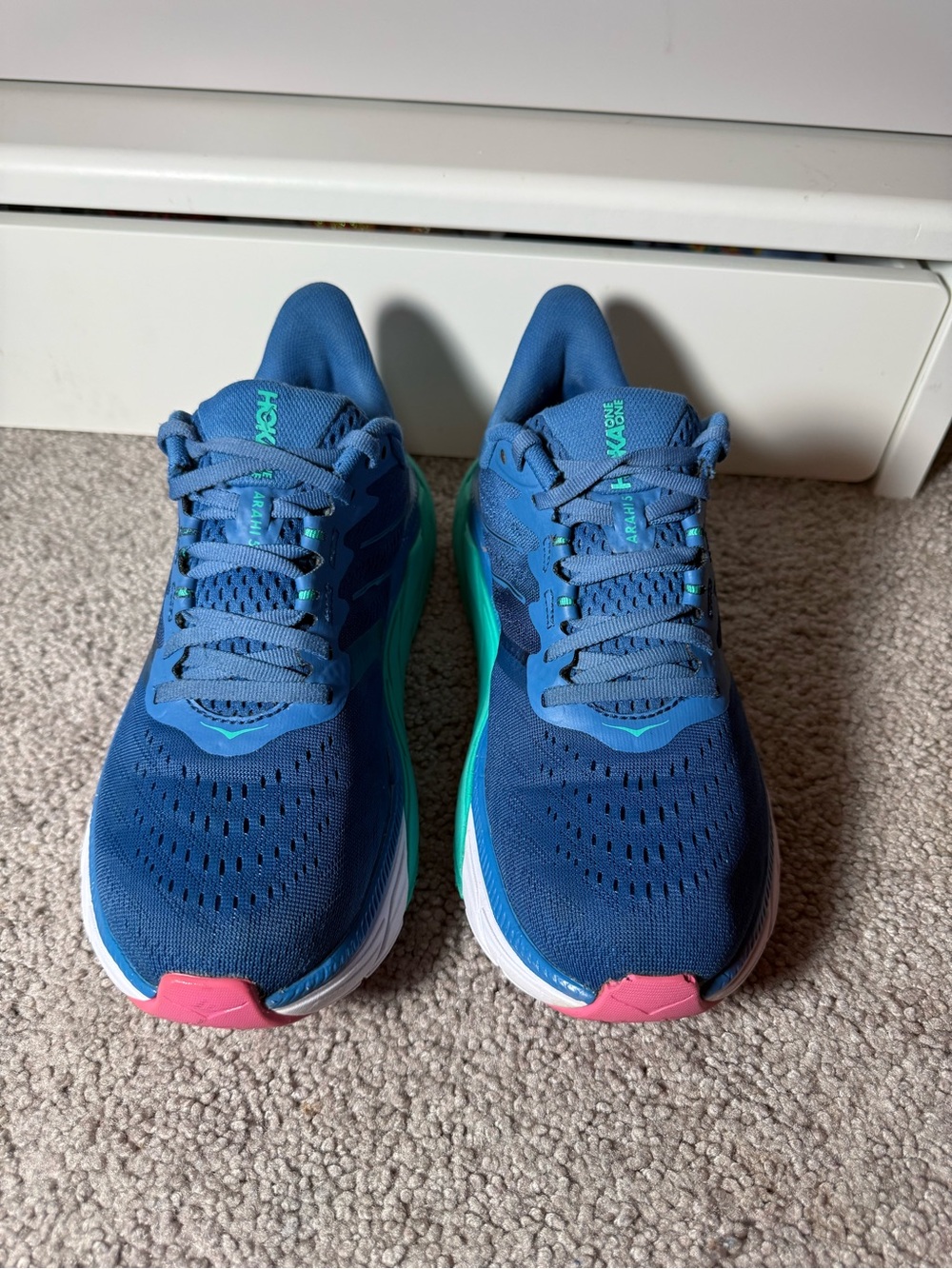 Hoka Women's Navy Blue Athletic Running Shoes with Teal and Pink Accents